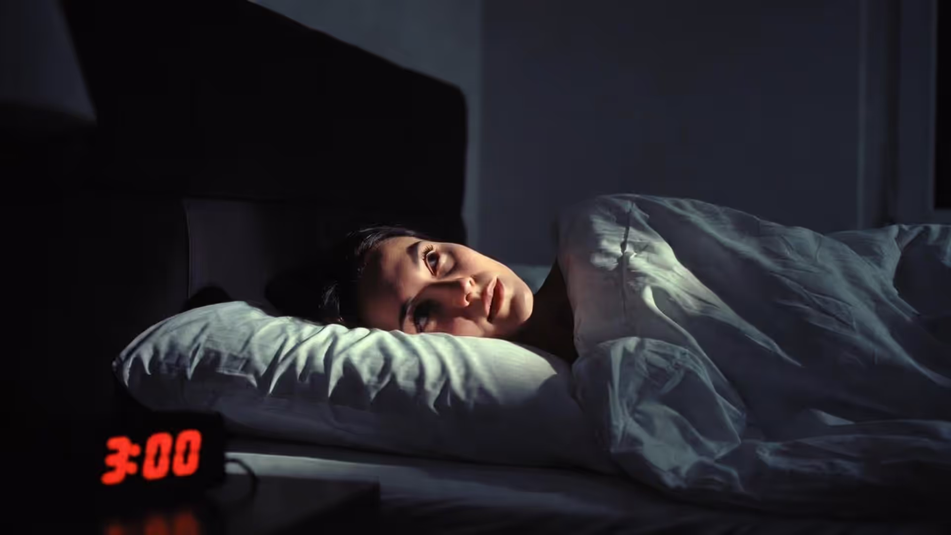 A person cannot sleep at night because of obsessive thoughts